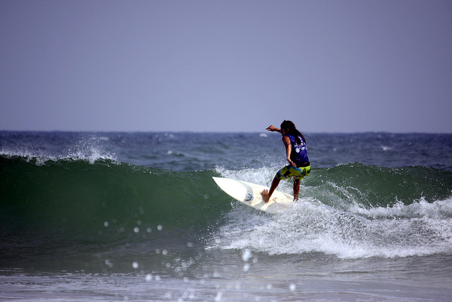 Surfing in Kovalam Beach